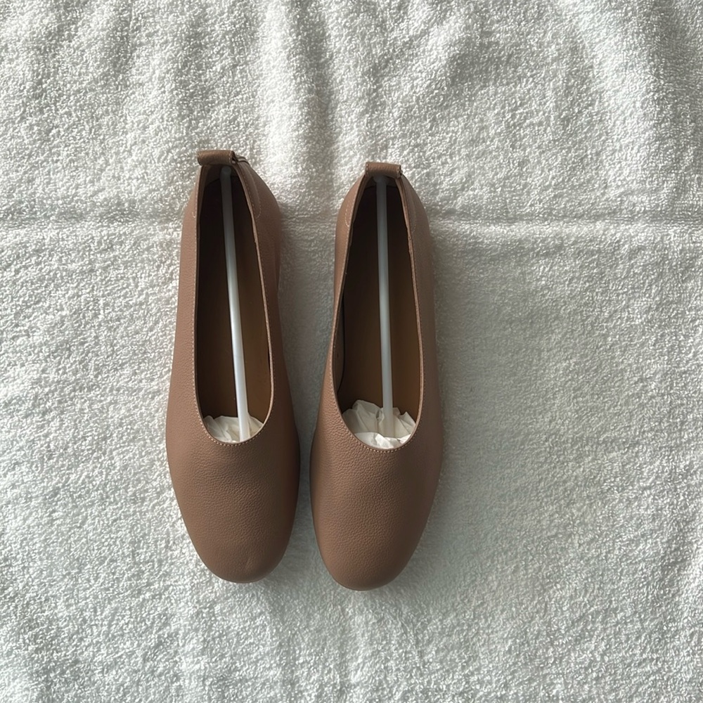 Tan leather The Day Glove ballet flats by Everlane.